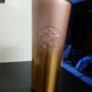Xl insulated starbucks cup with straw.